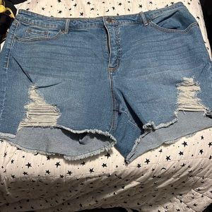 Light washed distressed denim shorts